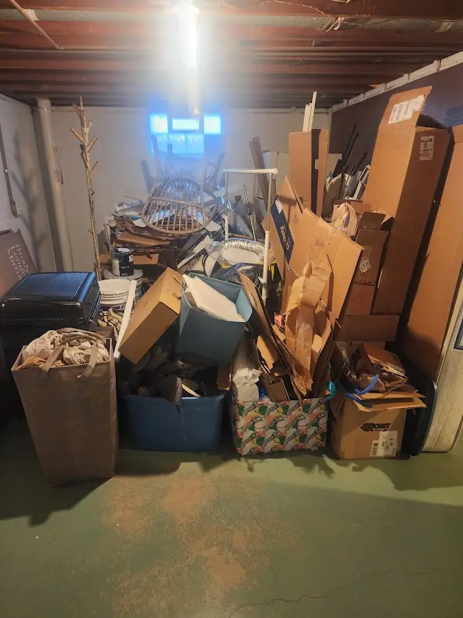 Roll-off dumpster container at job site for Yard Waste Dumpster Rental in Hudson